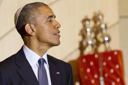 President Barack Obama, wearing a traditional Jewish yarmulke, speaks at Adas Israel Congregation in Washington, Friday May 22, 2015, as part of Jewish American Heritage Month. The president addressed one of the largest Jewish congregations in Washington to highlight efforts to combat anti-Semitism, a problem he says has created an intimidating environment worldwide for Jewish families. The appearance coincides with Solidarity Shabbat, devoted to showing unity by political leaders in Europe and North America against anti-Semitism. (AP Photo/Jacquelyn Martin)